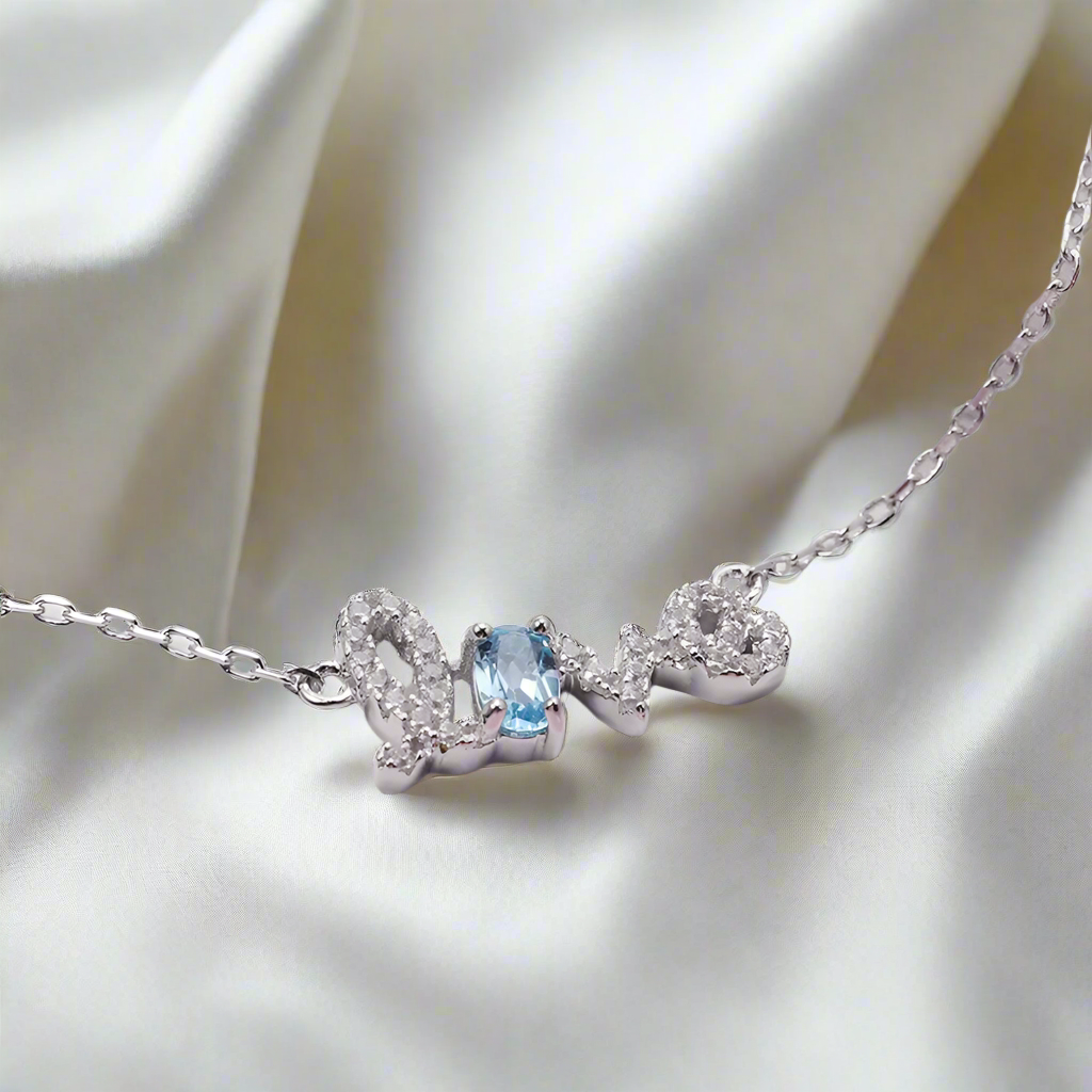 Pulsera ajustable con piedras preciosas "Love" en cursiva GRACE en plata de ley