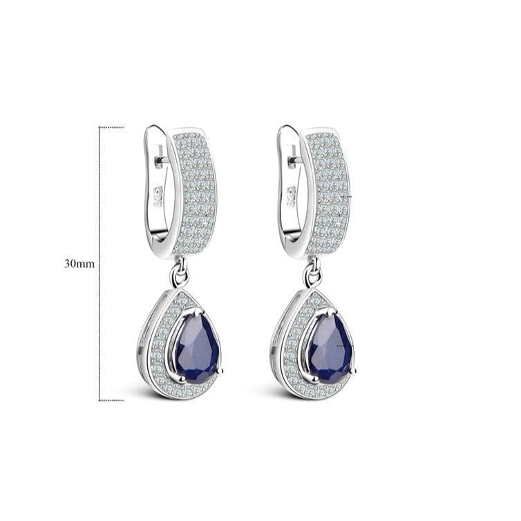 Conjunto de joyas GRACE con zafiro azul talla pera y halo en plata de ley