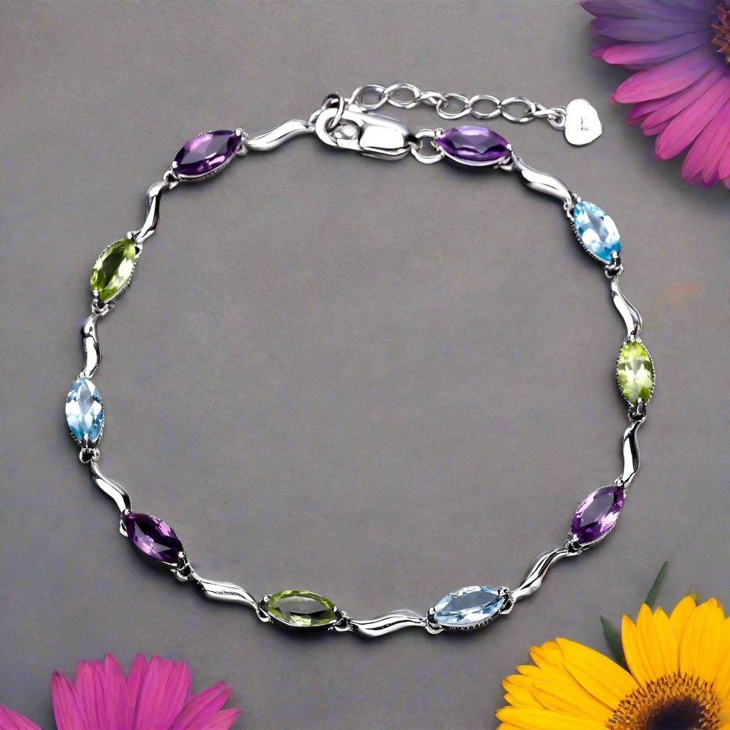 Pulsera GRACE de topacio azul cielo, amatista y peridoto en plata de ley