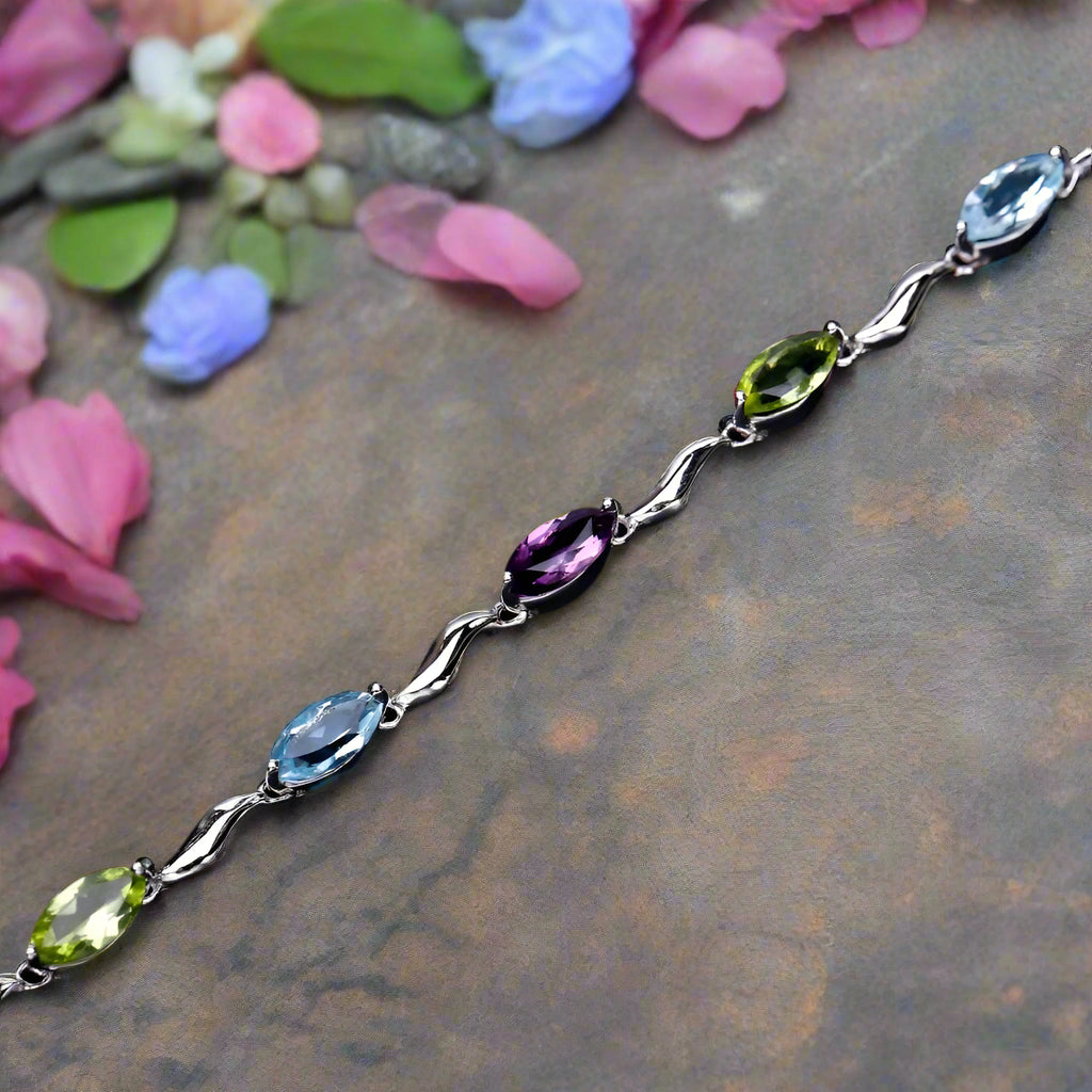 Pulsera GRACE de topacio azul cielo, amatista y peridoto en plata de ley