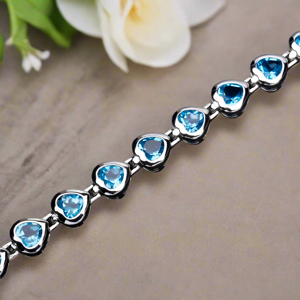 Pulsera GRACE con topacio azul suizo en forma de corazón en plata de ley