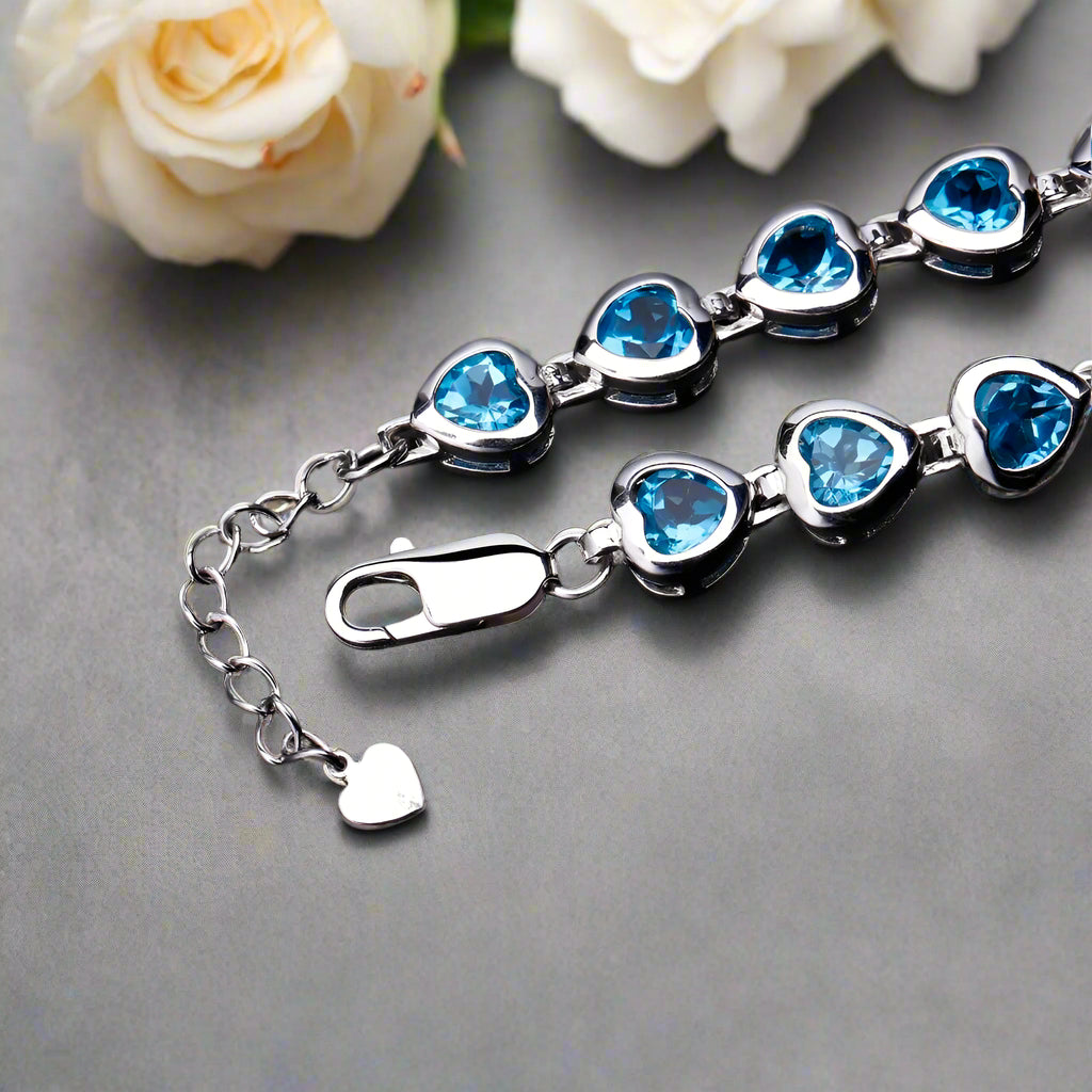 Pulsera GRACE con topacio azul suizo en forma de corazón en plata de ley