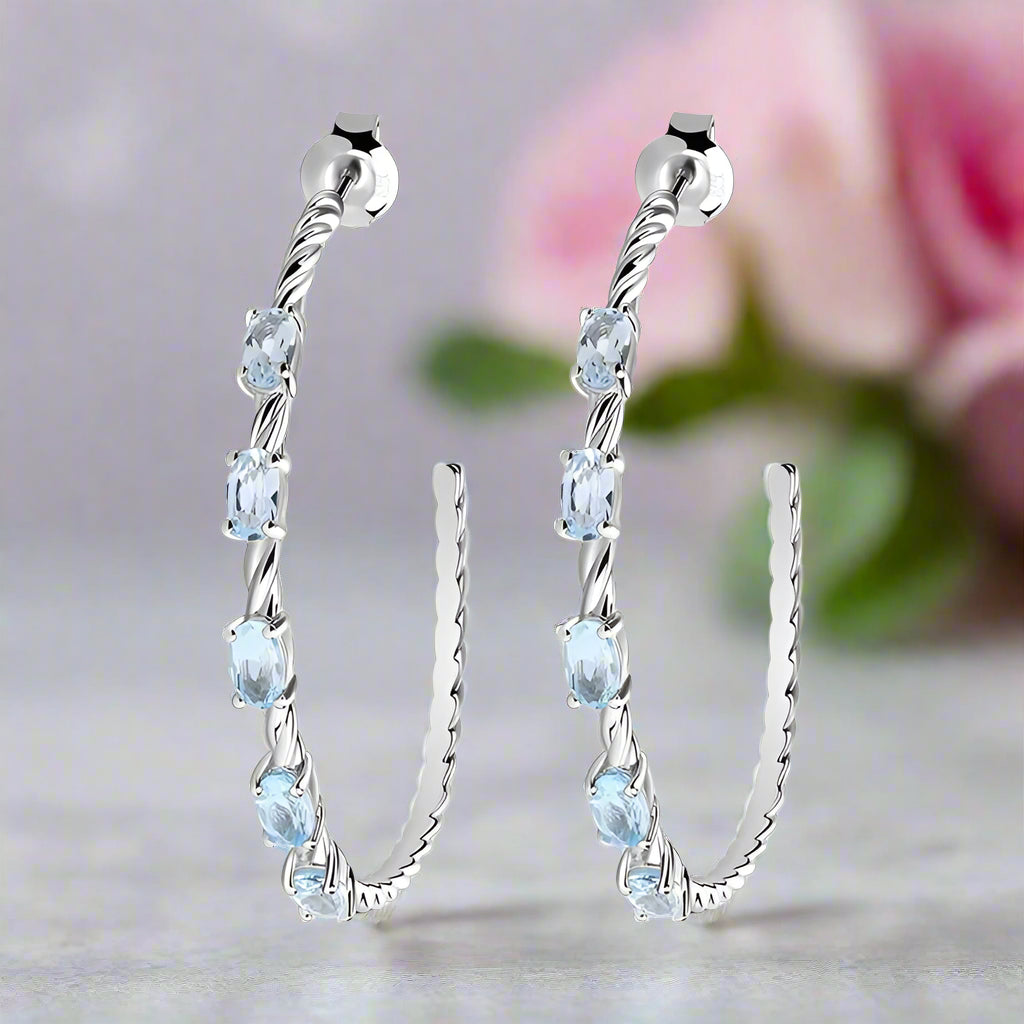 Boucles d'oreilles créoles GRACE en argent sterling avec topaze bleu ciel