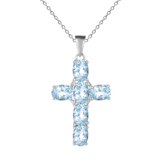 Collar con colgante de cruz de topacio azul cielo ovalado GRACE en plata de ley