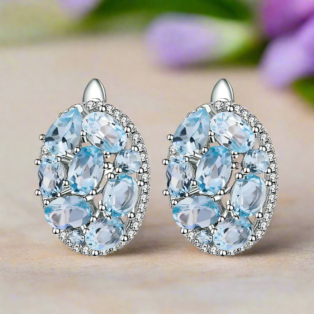 GRACE Sky Blue Topaz Oval Cluster Halo Drop Earrings in Sterling Silver