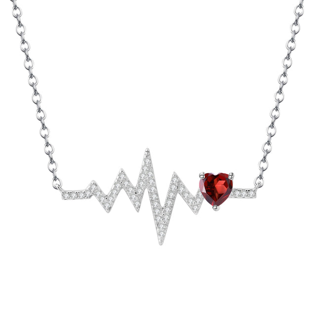 Collar GRACE con corazón de granate rojo y pulso en plata de ley bañada en oro