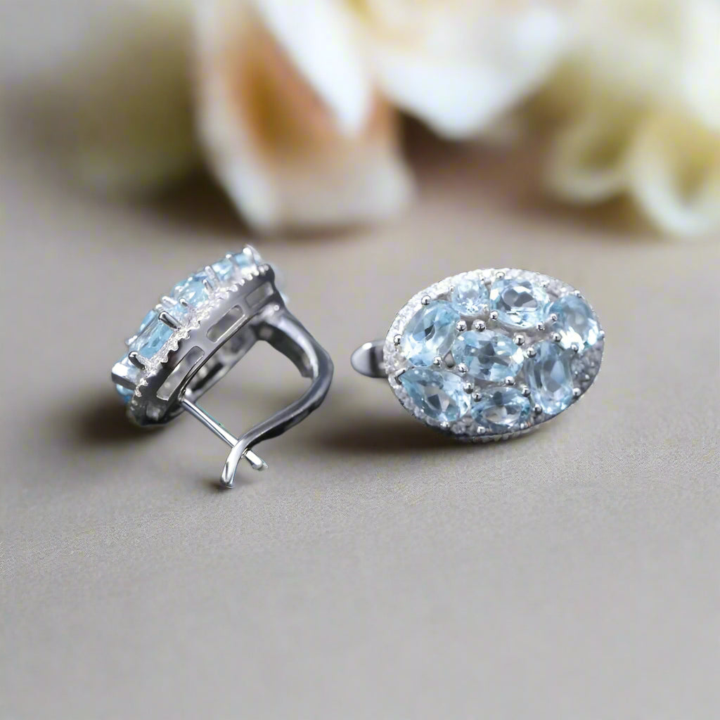 GRACE Sky Blue Topaz Oval Cluster Halo Drop Earrings in Sterling Silver