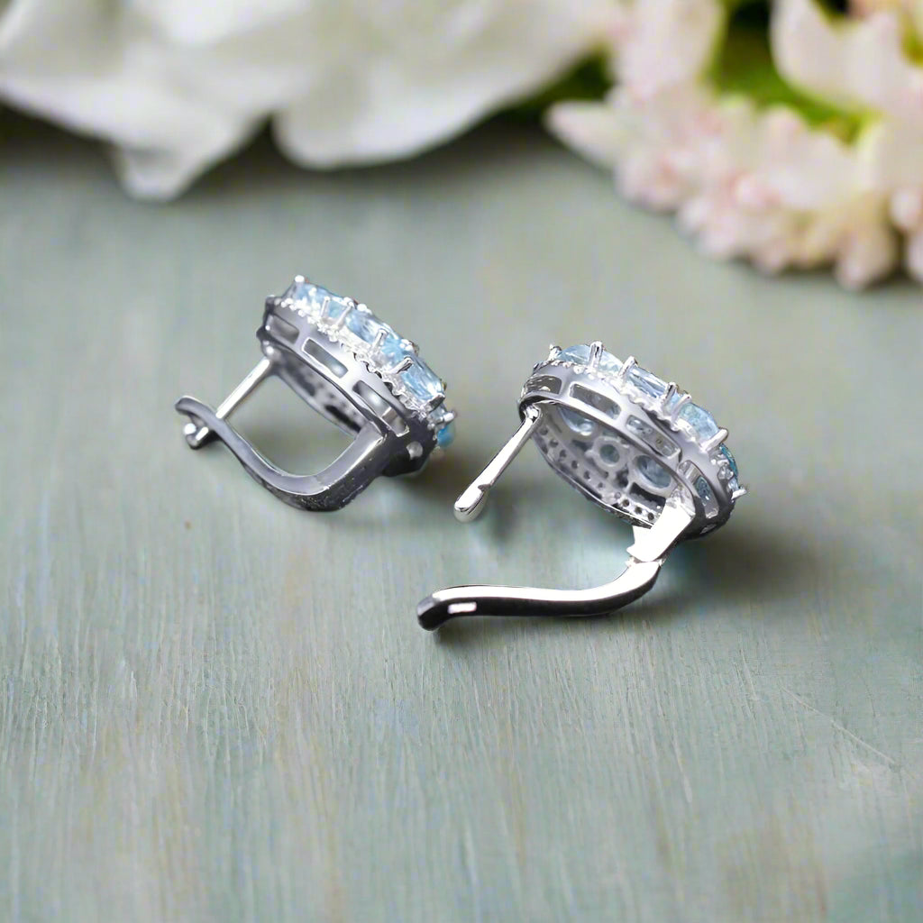 GRACE Sky Blue Topaz Oval Cluster Halo Drop Earrings in Sterling Silver