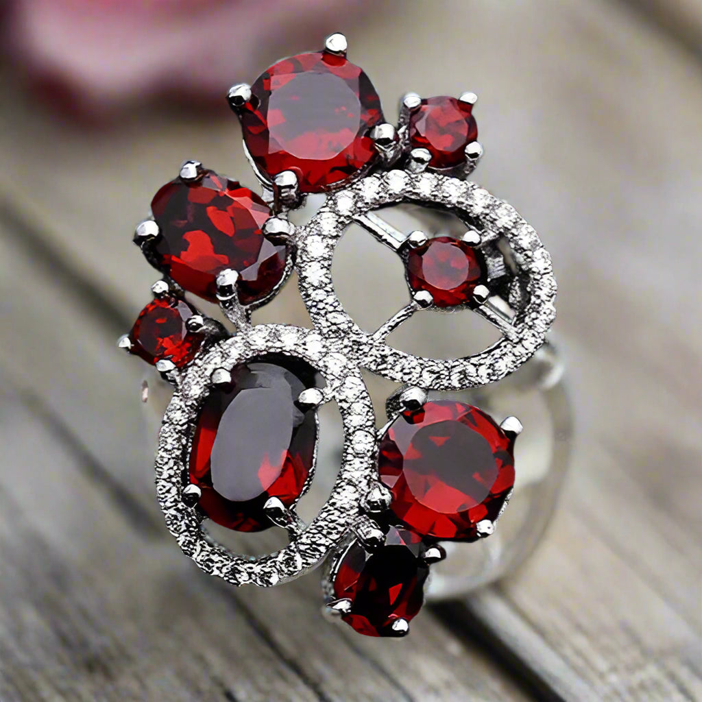 Conjunto de pendientes y anillos con flor de granate rojo GRACE en plata de ley