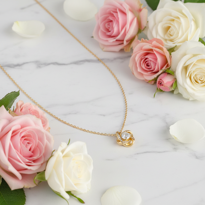 Collier avec nœud d'amour « Je vous salue Marie » et rose éternelle, accompagné d'une carte de prière en anglais