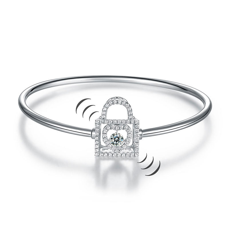 Pulsera con candado de corazón y piedra danzante
