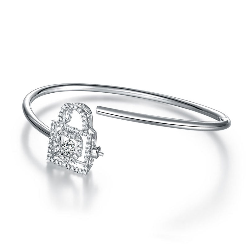 Pulsera con candado de corazón y piedra danzante