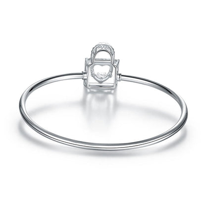 Pulsera con candado de corazón y piedra danzante