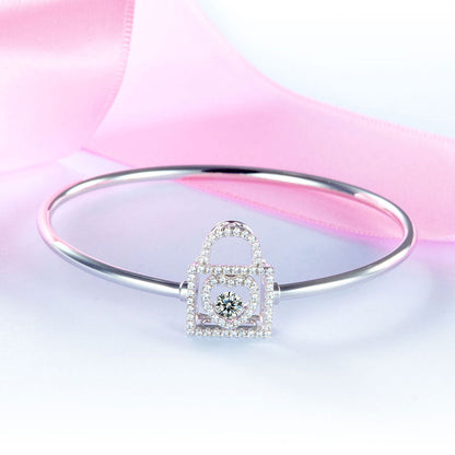 Pulsera con candado de corazón y piedra danzante