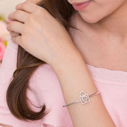 Pulsera con candado de corazón y piedra danzante