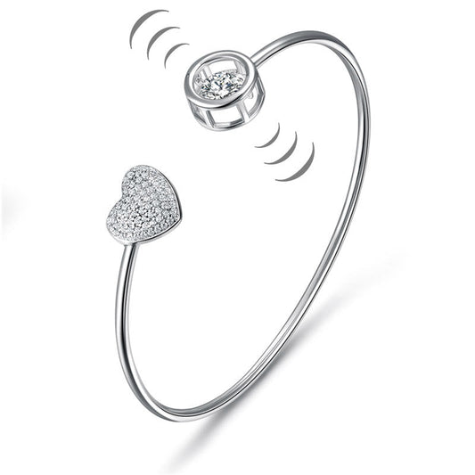 Pulsera con corazón pavé y piedras danzantes