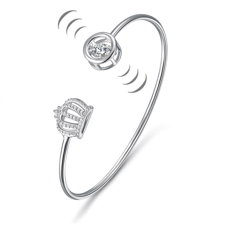 Brazalete de plata de ley con piedra danzante y corona
