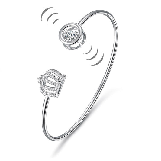 Brazalete de plata de ley con piedra danzante y corona