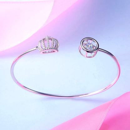 Brazalete de plata de ley con piedra danzante y corona