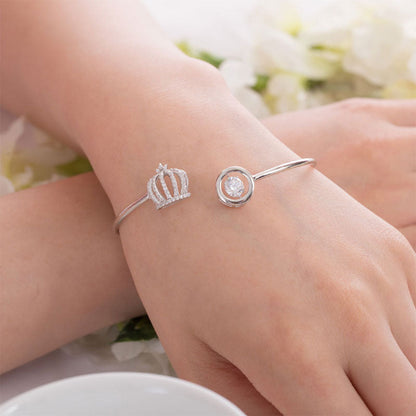 Brazalete de plata de ley con piedra danzante y corona