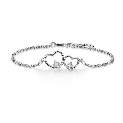 Bracelet double cœur en argent sterling avec zircones cubiques