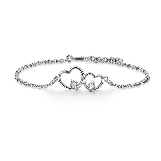 Bracelet double cœur en argent sterling avec zircones cubiques