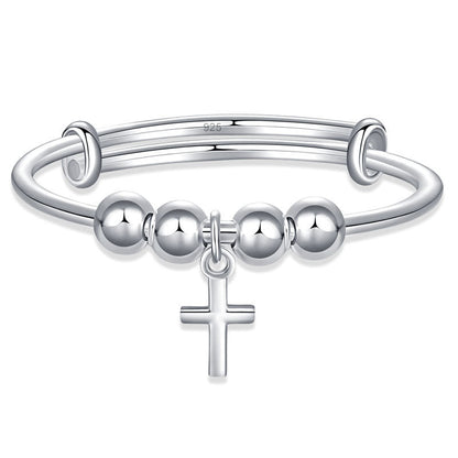 Pulsera ajustable con cruz en plata de ley para niñas