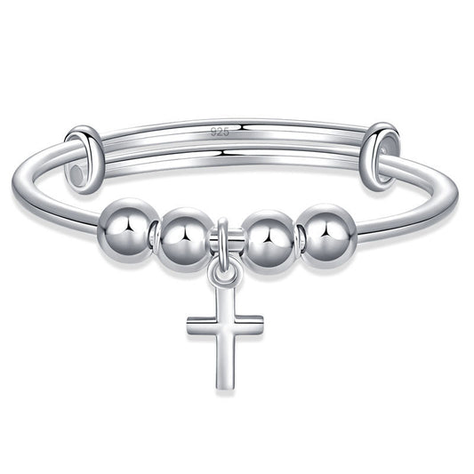 Pulsera ajustable con cruz en plata de ley para niñas