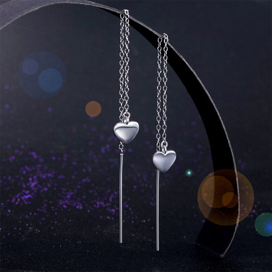 Pendientes largos de corazón en plata de ley