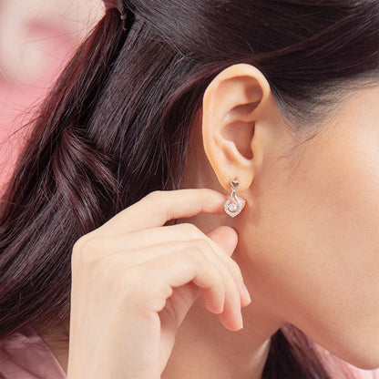 Pendientes colgantes con forma de lágrima de corazón y piedra danzante
