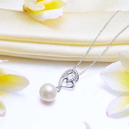 Collier avec pendentif en forme de cœur et perles d'eau douce en argent sterling