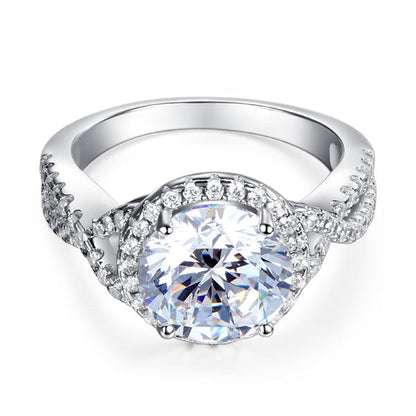 Anillo de 3 quilates con diamante simulado de talla brillante redonda y cuerpo retorcido en plata de ley.
