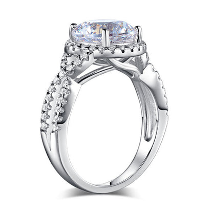 Anillo de 3 quilates con diamante simulado de talla brillante redonda y cuerpo retorcido en plata de ley.