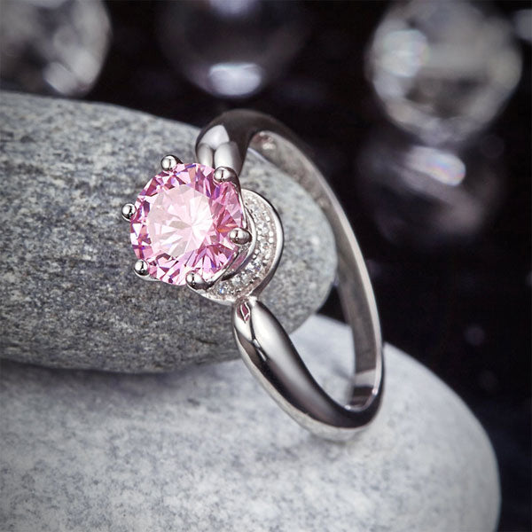 1.25 CT. Round Brilliant Cut Pink Simulated Diamond Halo Ring in Sterling Silver