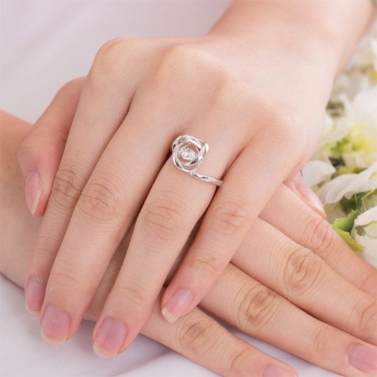 Bague en pierre dansante avec nœud d'amour