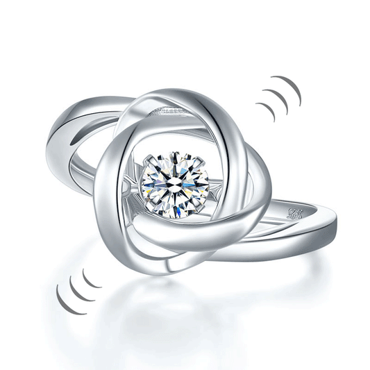 Bague en pierre dansante avec nœud d'amour