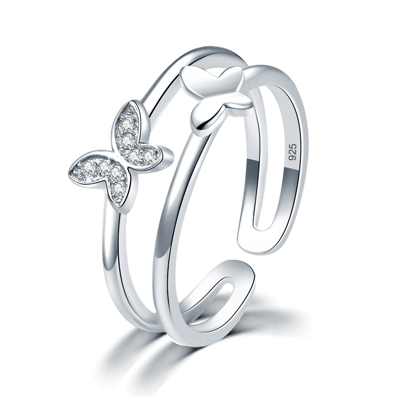 Anillo de puño de doble banda con mariposa en plata de ley