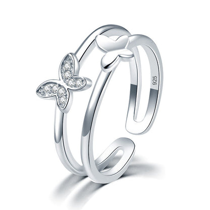 Anillo de puño de doble banda con mariposa en plata de ley