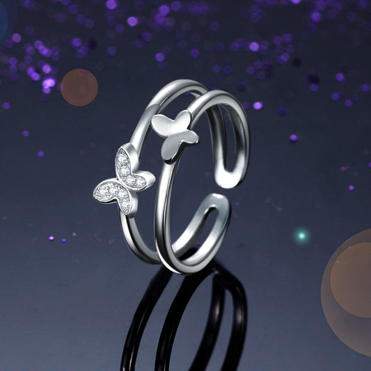 Anillo de puño de doble banda con mariposa en plata de ley