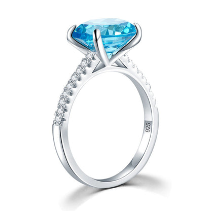 Anillo de diamantes simulados azul aguamarina de talla ovalada de 4 quilates en plata de ley