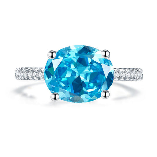 Anillo de diamantes simulados azul aguamarina de talla ovalada de 4 quilates en plata de ley