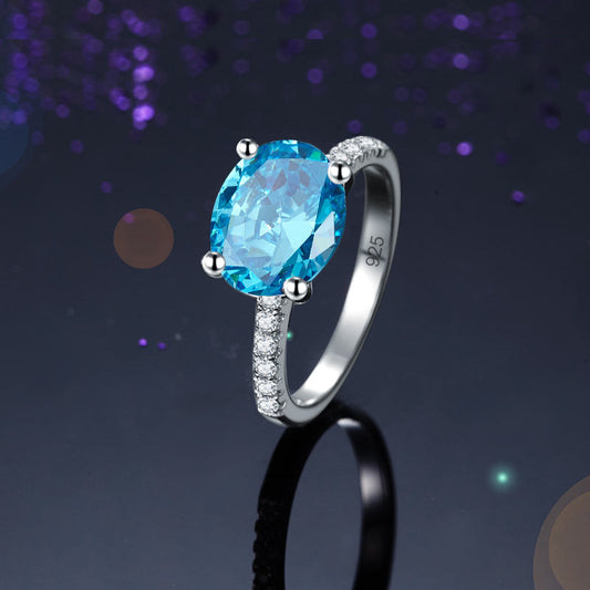 Anillo de diamantes simulados azul aguamarina de talla ovalada de 4 quilates en plata de ley