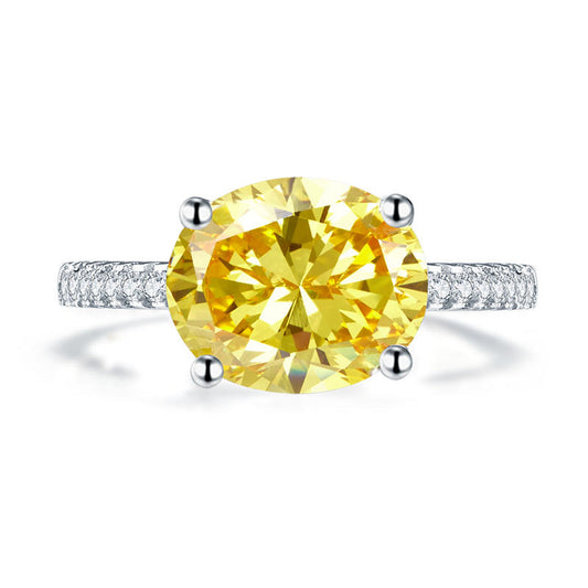 Anillo de plata de ley con diamante amarillo simulado de talla ovalada de 4 quilates