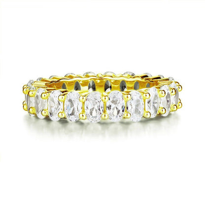 Anillo de eternidad con diamantes simulados de talla ovalada en oro amarillo y plata de ley.