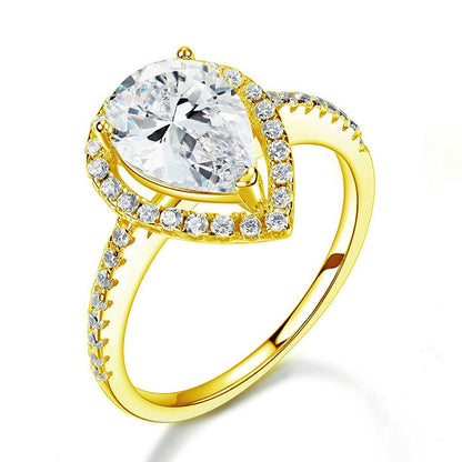 Anillo de halo de diamantes simulados de talla pera de 2 quilates en plata de ley bañada en oro amarillo.