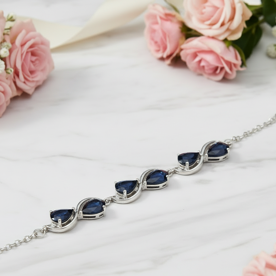 GRACE Pear Cut Gemstone Twist Style Bracelet in Sterling Silver