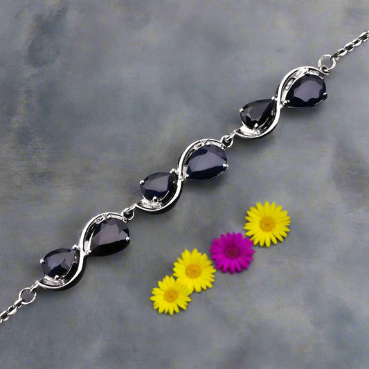 GRACE Pear Cut Twist Style Bracelet in Sterling Silver