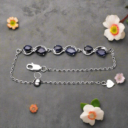GRACE Pear Cut Twist Style Bracelet in Sterling Silver