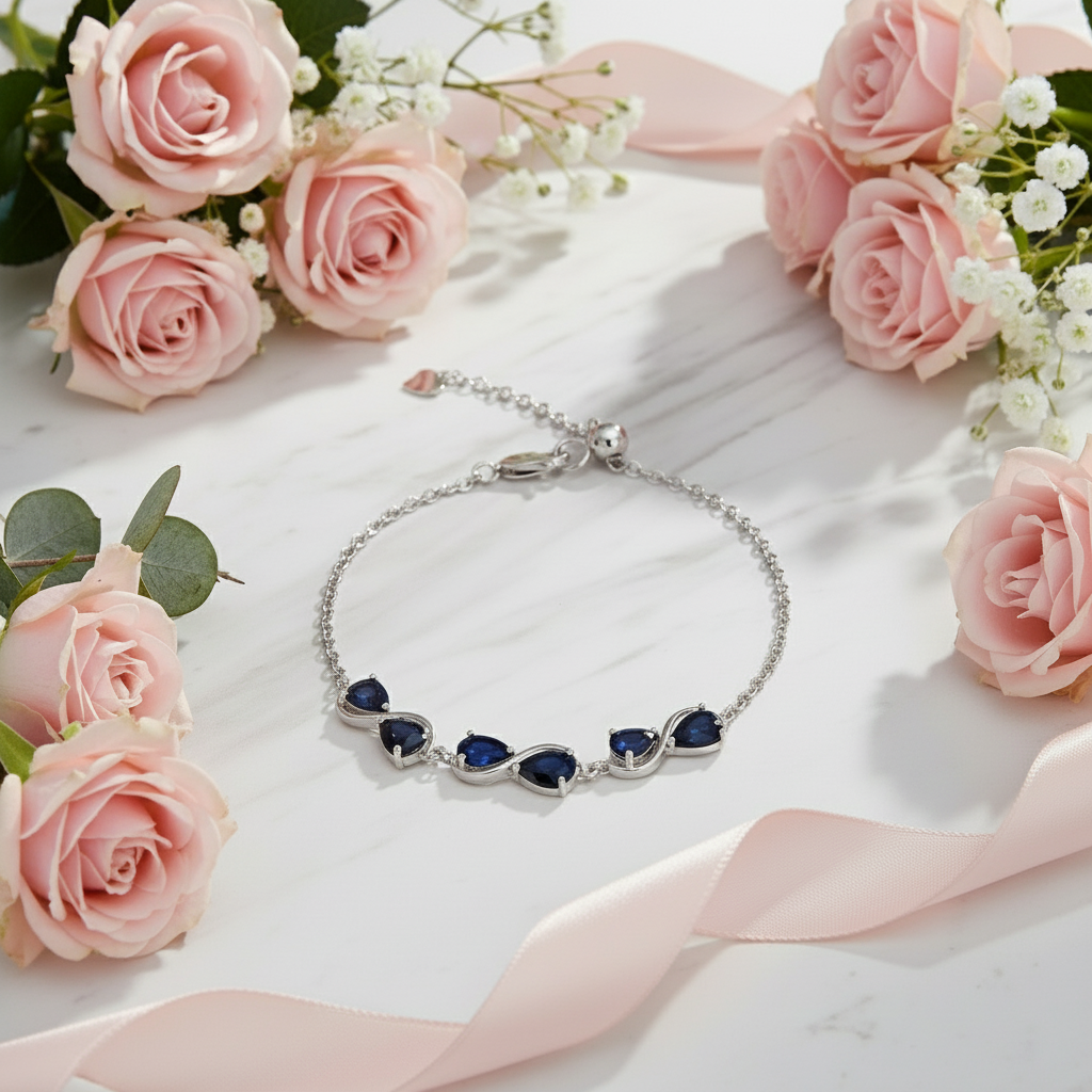 GRACE Pear Cut Gemstone Twist Style Bracelet in Sterling Silver