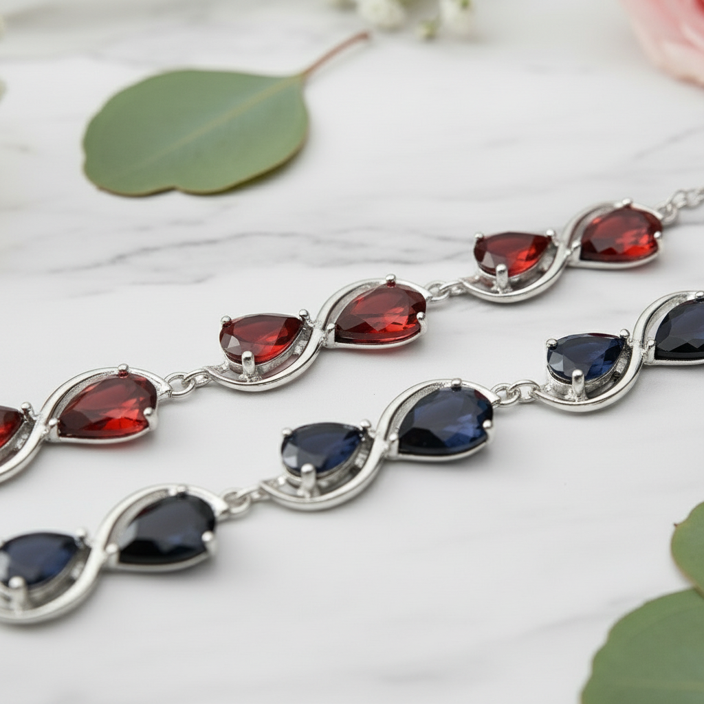 GRACE Pear Cut Gemstone Twist Style Bracelet in Sterling Silver